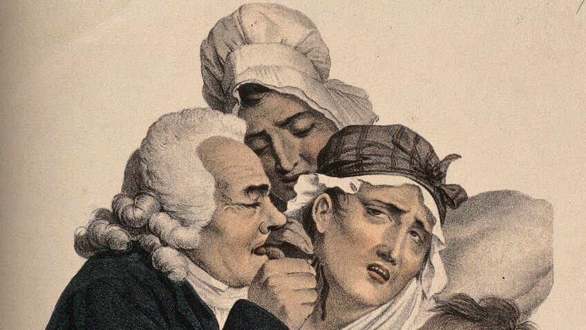V0011719 A physician administers leeches to a patient.