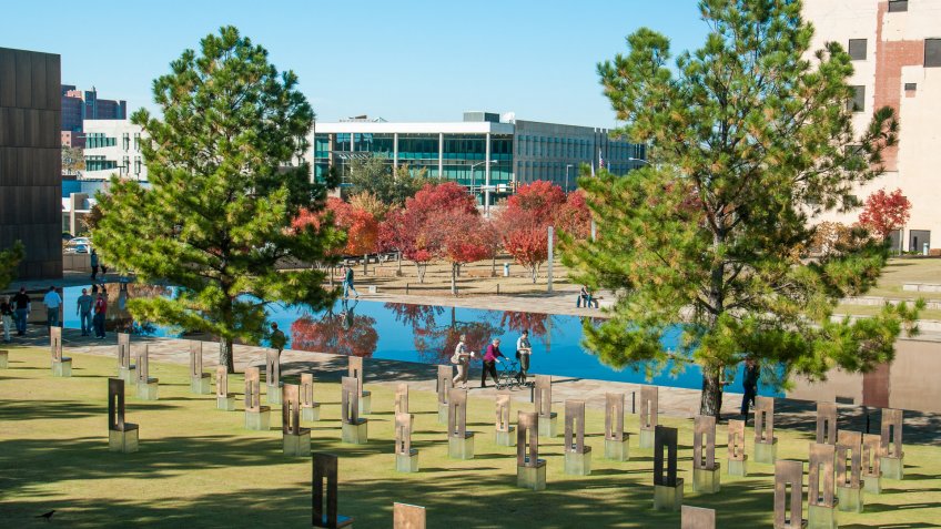People visit the Field of 168 Empty Chairs epresent those who lost their lives in the Oklahoma city terrorist bombing on April 19, 1995.