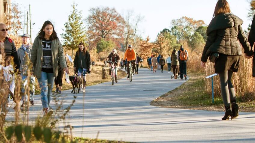 people walking and bicycling in The Beltline in Atlanta Georgia