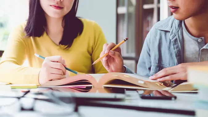 private tutor helping student with test preparation