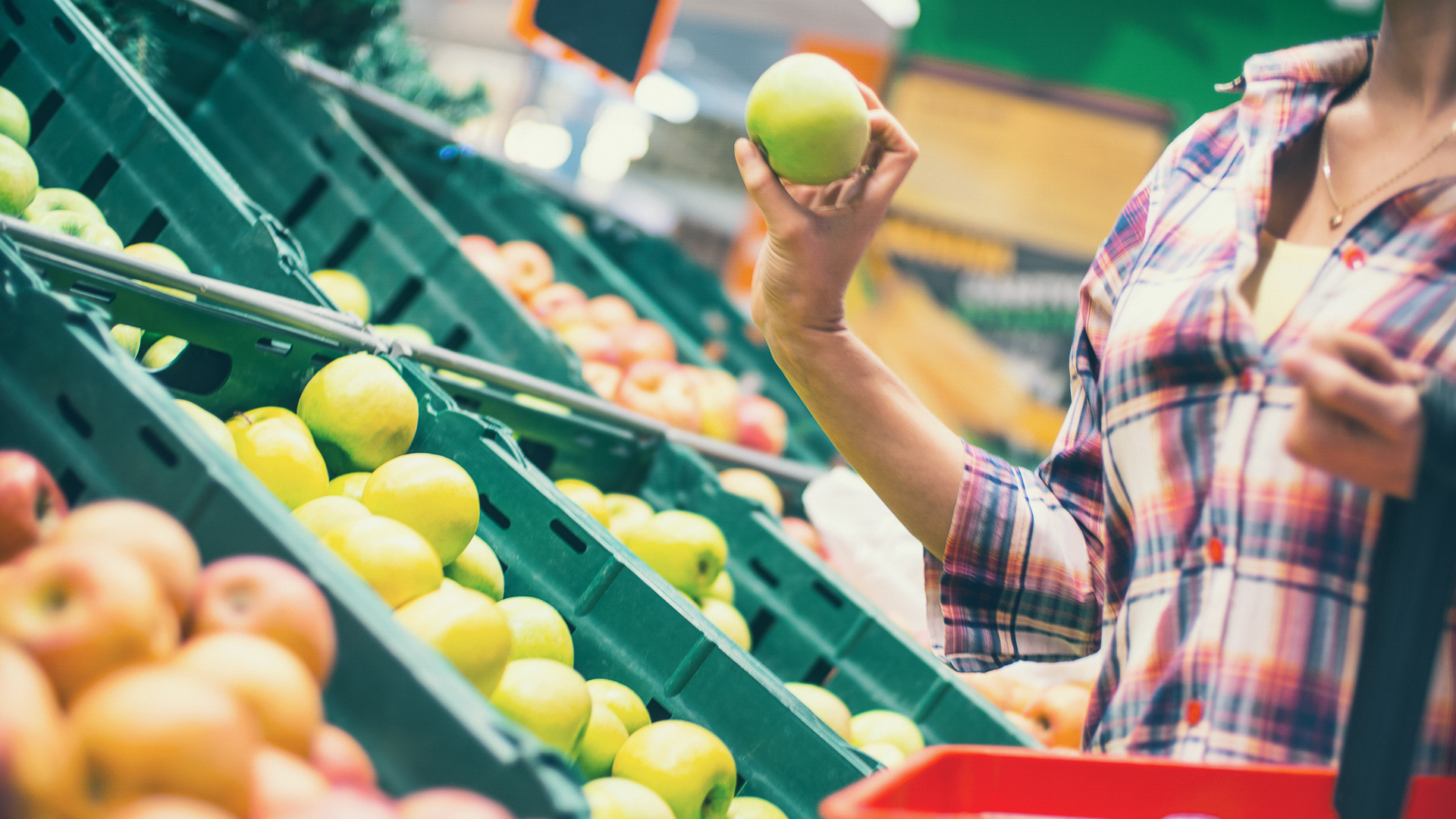 woman grocery shopping fresh produce