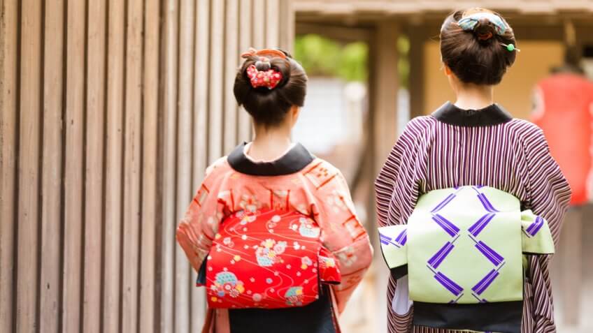 Mother and Daughter Exploring a Small Village Somewhere in Japan.