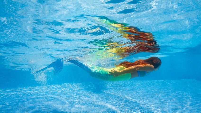 mermaid underwater in pool