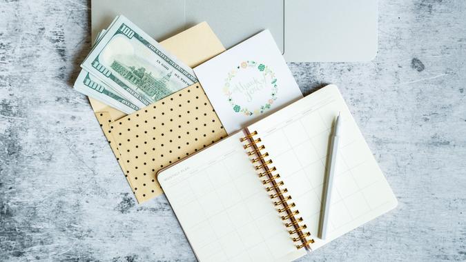money gift card-shutterstock_1127158076 money gift card