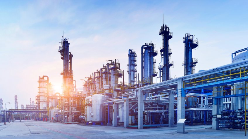 Oil Refinery, Chemical & Petrochemical plant at sunset.