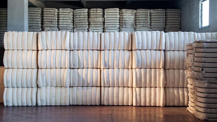 raw cotton bales in warehouse
