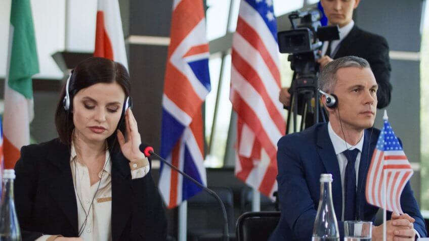 translators listening to conference