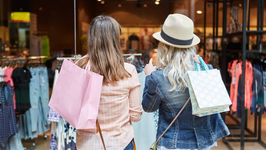 two women shopping for clothes