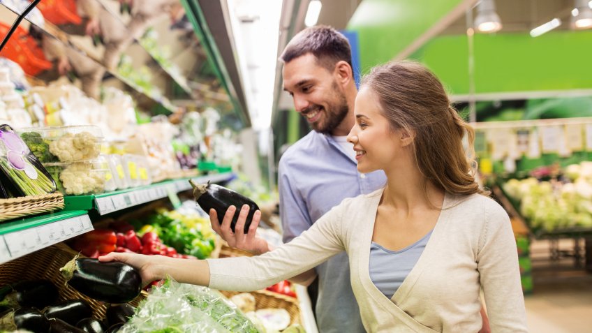 woman grocery shopping for her male student