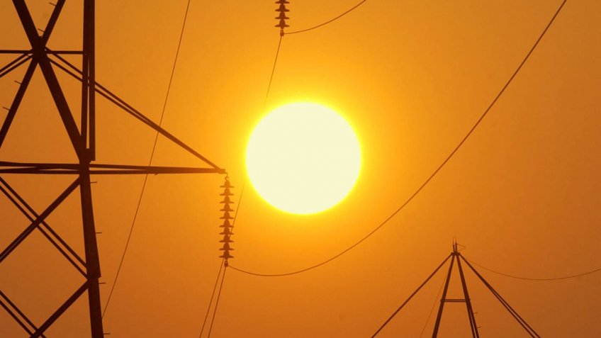 Mandatory Credit: Photo by Mark A Duncan/AP/Shutterstock (6421500a)The setting sun silhouettes electric transmission lines crossing Berea, Ohio .