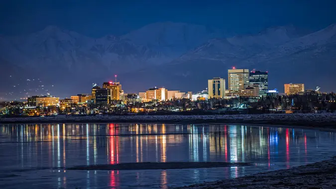 Anchorage skyline with Cook Inlet reflection.