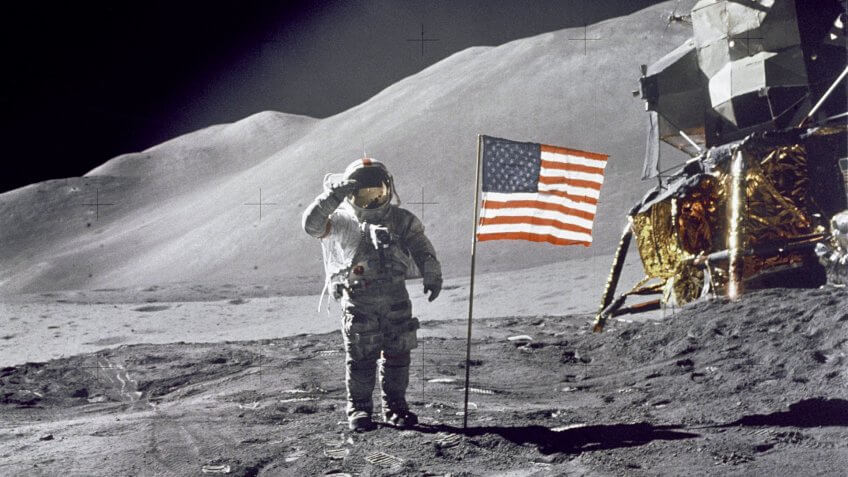 Astronaut David Scott saluting American flag