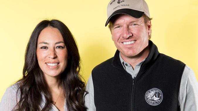 Mandatory Credit: Photo by Brian Ach/Invision/AP/Shutterstock (9213260a)Joanna Gaines, left, and Chip Gaines pose for a portrait in New York to promote their home improvement show, "Fixer Upper," on HGTVChip and Joanna Gaines Portrait Session, New York, USA - 29 Mar 2016.
