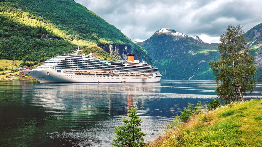 Dramatic summer scene of Geiranger port, western Norway.