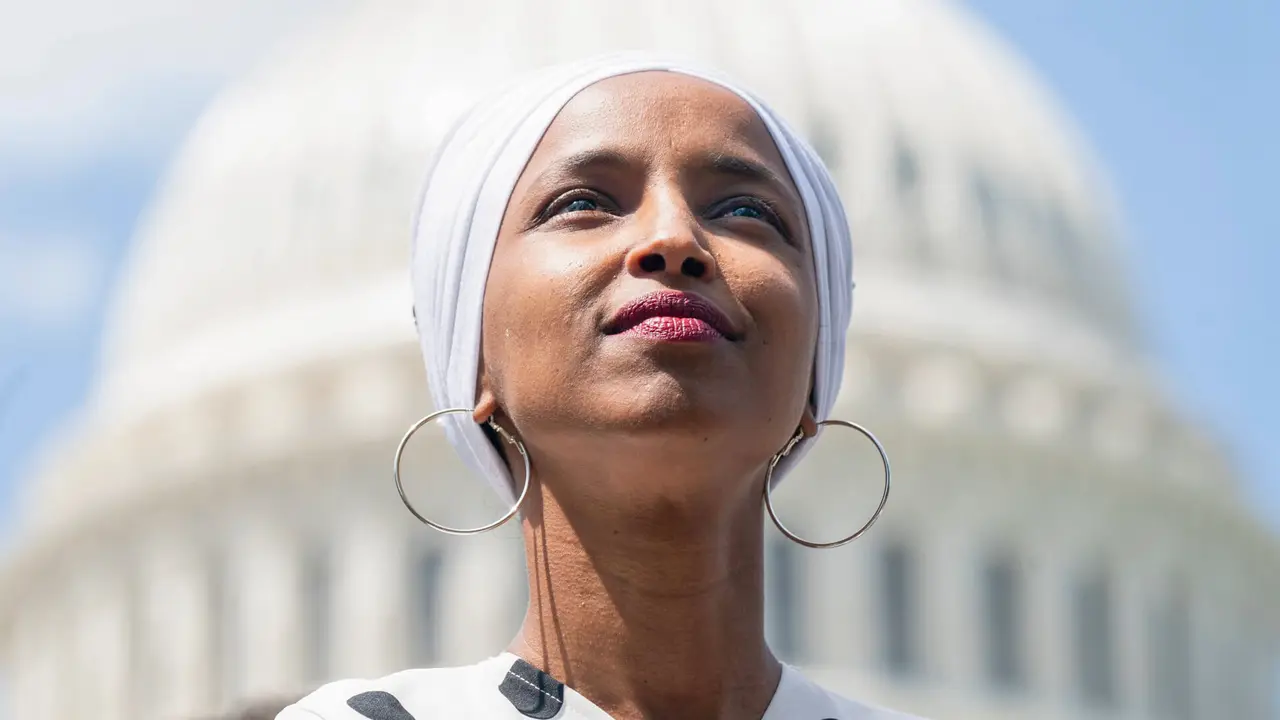 Mandatory Credit: Photo by JIM LO SCALZO/EPA-EFE/Shutterstock (10320500j)Democratic Representative from Minnesota Ilhan Omar listens to Independent Senator from Vermont Bernie Sanders (not pictured) speak to journalists about his plan to eliminate all $1.
