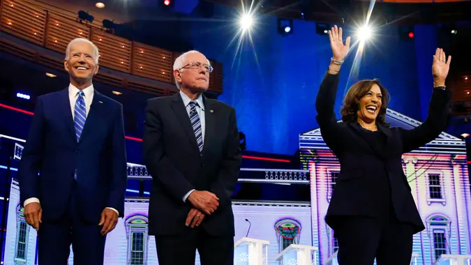 Mandatory Credit: Photo by Brynn Anderson/AP/Shutterstock (10323369am)Democratic presidential candidates former vice president Joe Biden, left, Sen.