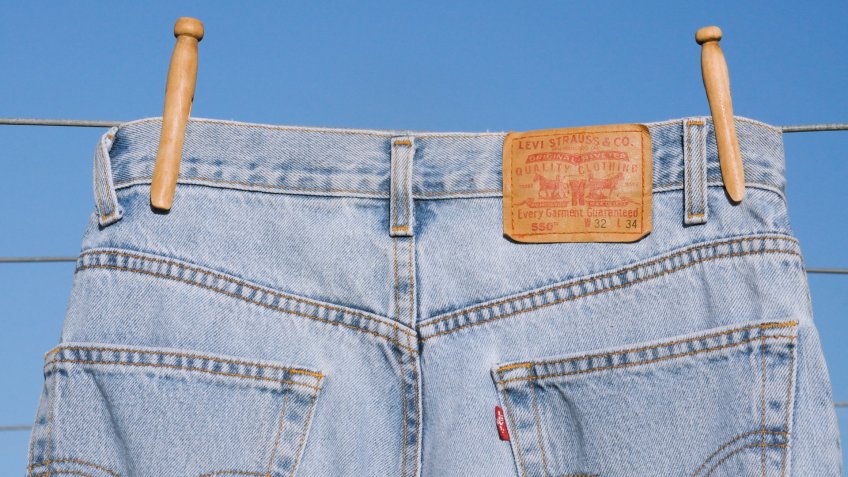 Levi Strauss denim jeans hanging on a laundry line