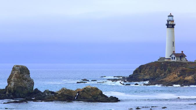 Nice emblems at Lompoc, California, the Point Conception Lighthouse nad Indian Head Rock at the coast.