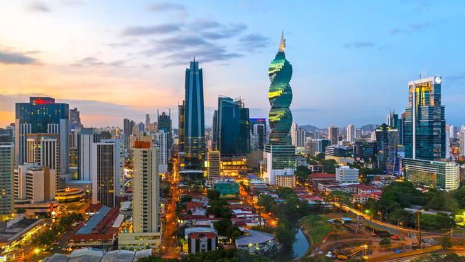 The colorful urban skyline of Panama city with a view over the financial district at sunset, Panama, Central America.