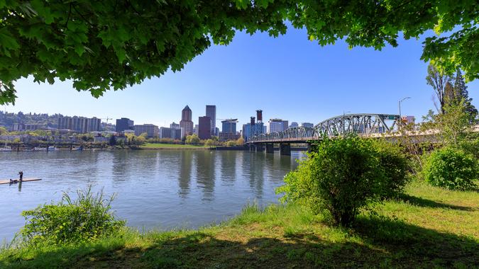 Hawthorne bridge on Willamette river with cityscape and skyline in portland - Image.