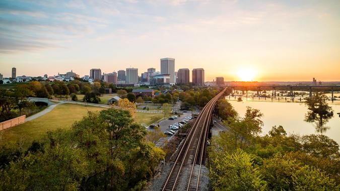 Downtown Richmond, Virginia skyline and the James River at twilight. - Image Downtown Richmond, Virginia skyline and the James River at twilight.