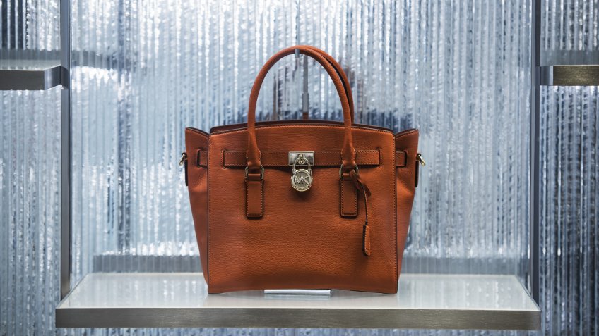 Simone manufactures luxury handbag like Michael Kors
