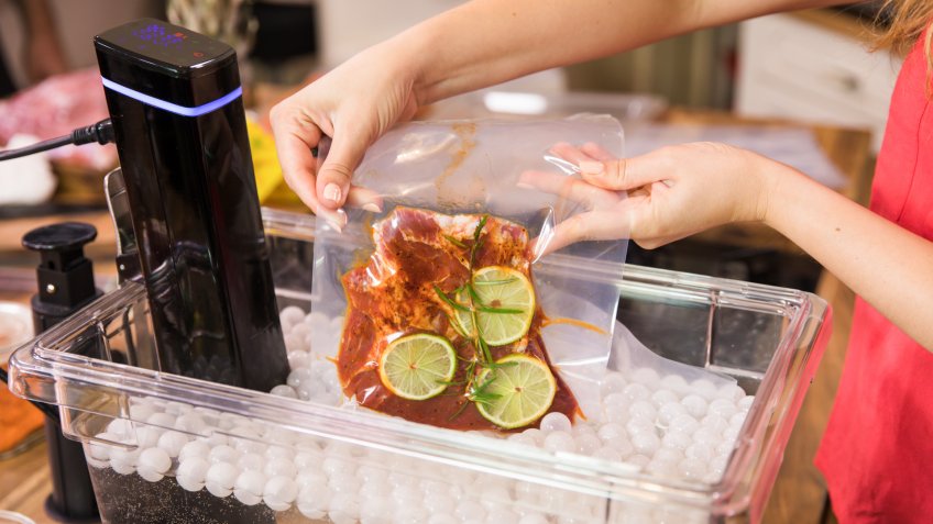 Close up of chef cooking sous vide.