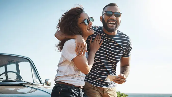 Shot of a young couple enjoying a summer’s road trip together.