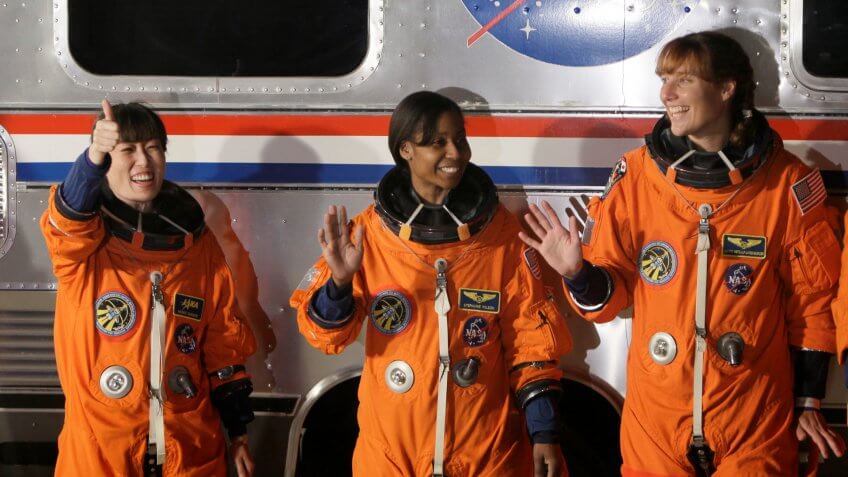 female astronauts Naoko Yamazaki, Stephanie Wilson, and Dorothy Metcalf