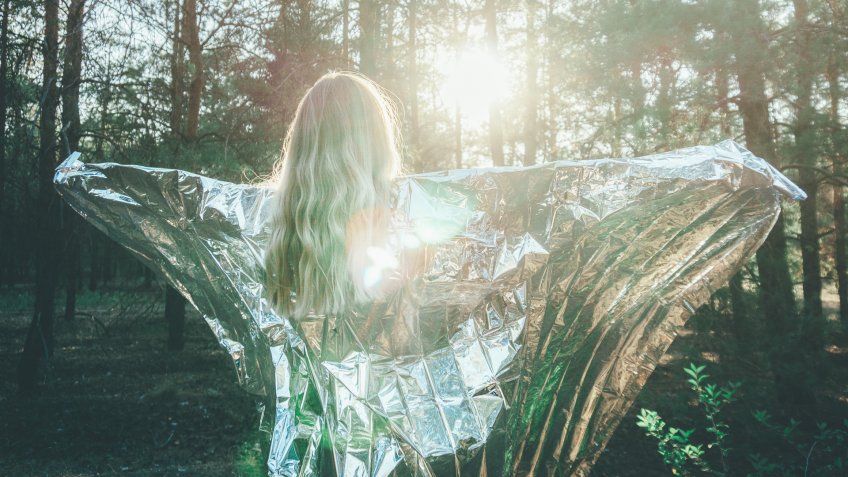 girl with foil blankets