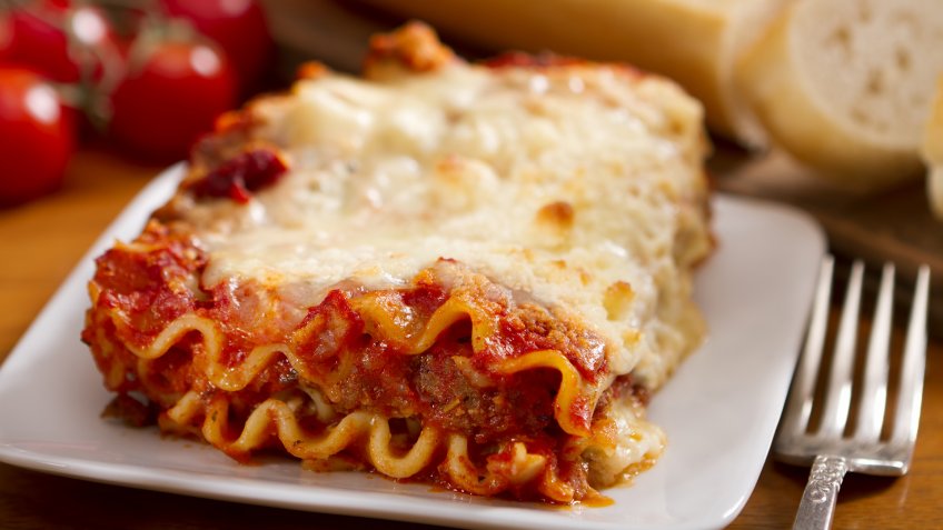 A single serving of freshly made meat and cheese lasagna.