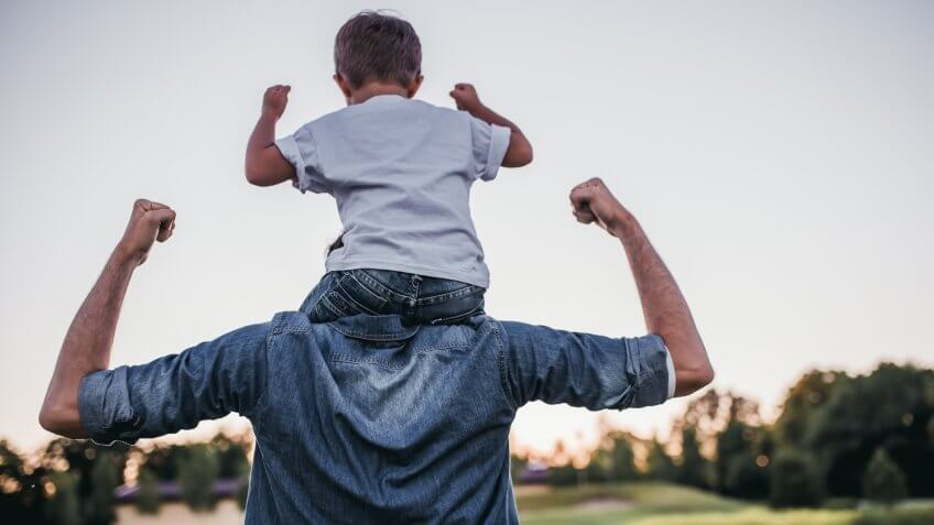 Dad and son having fun outdoors.