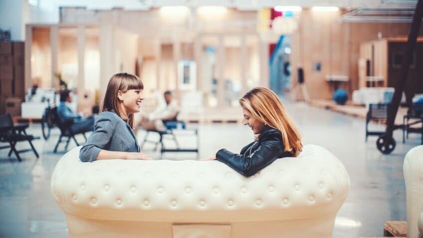 Colleagues resting in creative office space.