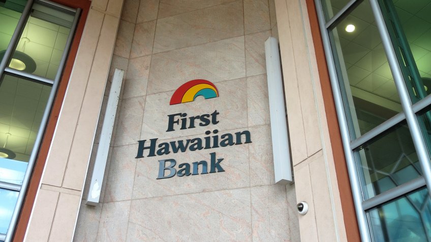 HONOLULU - APRIL 3: First Hawaiian Bank logo on side of Building in Honolulu, Hawaii April 3, 2014.