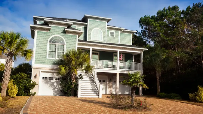 Carolina luxury cottage vacation home exterior in the summer.
