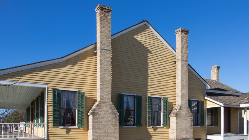 a grand Texas farm house from the late 1800s showing how important fireplaces were - Image.
