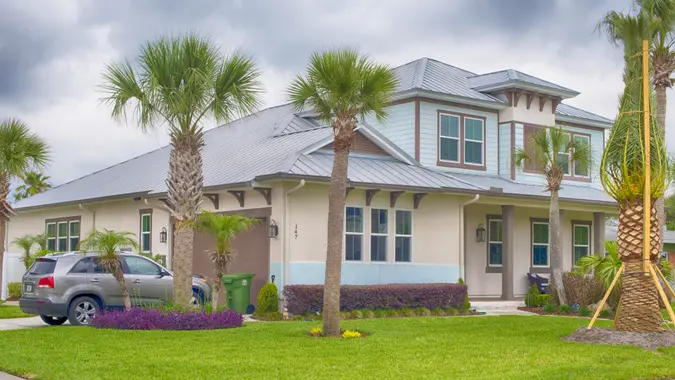 Jacksonville Florida, USA - MAY 04, 2016: Custom built luxury house with nicely trimmed front yard, lawn in a residential neighborhood.
