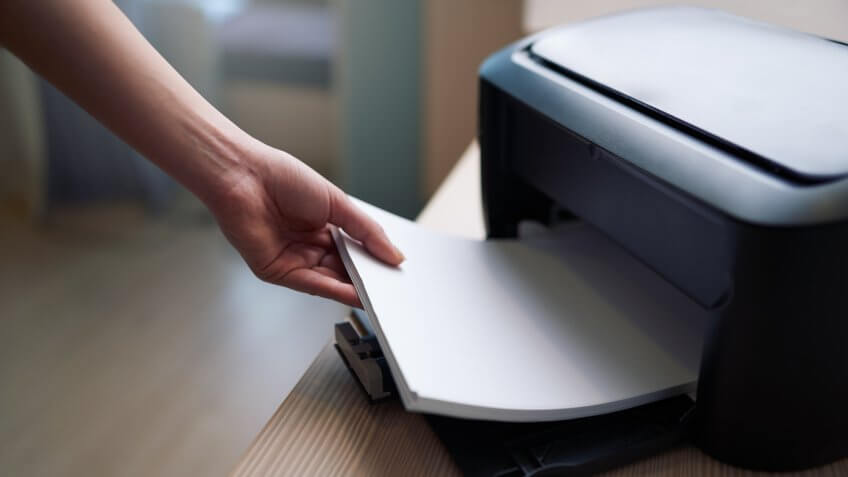 lay down or take the paper from printer - Image.