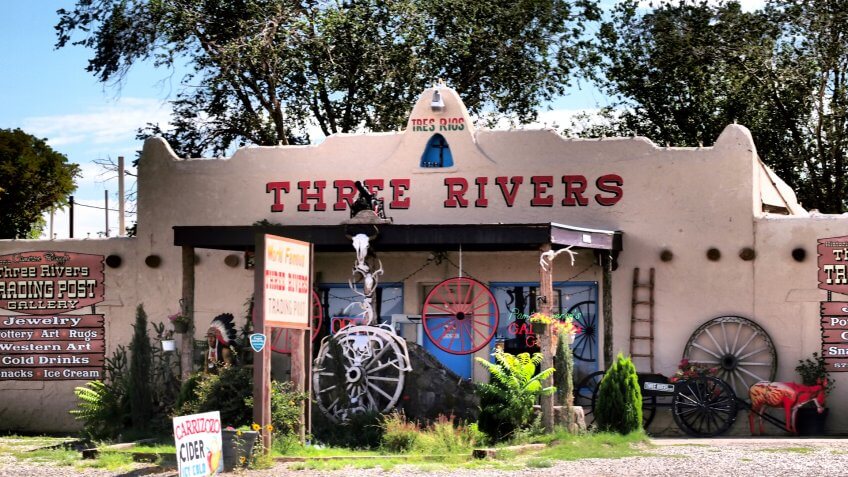Alamogordo, United States - August 16, 2011: Three rivers trading post, with trees and blue sky in background.
