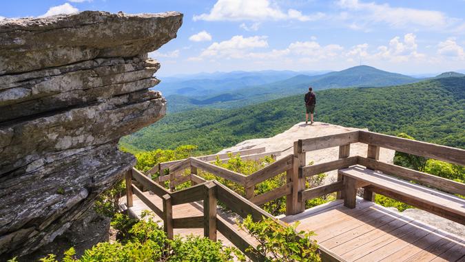 Rough Ridge Overlook near the stacked rock formation provides an expansive view of the summit of Grandfather Mountain and the ridges of Pisgah Forest and is off the Blue Ridge Parkway in Boone NC.