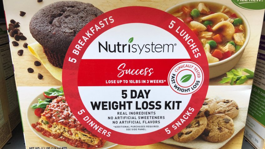 New Hope, Minnesota - May 26, 2019: Nutrisystem brand 5-day weight loss dieting kit, complete with all the meals, sits on a grocery store shelf - Image.