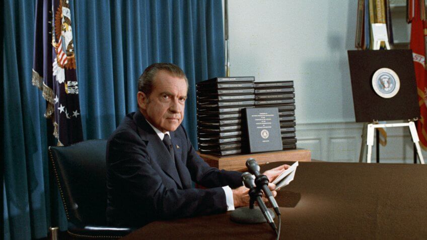 President Nixon with his edited transcripts of the White House Tapes subpoenaed by the Special Prosecutor, during his speech to the Nation on Watergate.