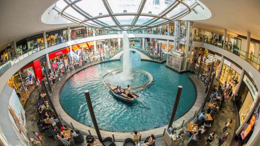 SINGAPORE - JUNE 6, 2015 : The Shoppes at Marina Bay Sands is one of Singapore's largest luxury shopping malls, with over 800,000 square feet of high-end retail shoppes.