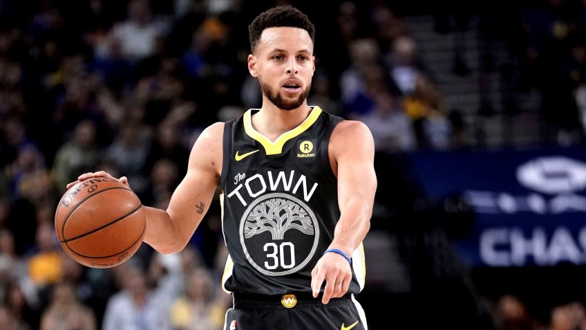 Mandatory Credit: Photo by John G Mabanglo/EPA-EFE/Shutterstock (9373398h)Stephen CurrySan Antonio Spurs at Golden State Warriors, Oakland, USA - 10 Feb 2018Golden State Warriors guard Stephen Curry sets up for a play against the San Antonio Spurs during the first half of their NBA game at Oracle Arena in Oakland, California, USA, 10 February 2018.
