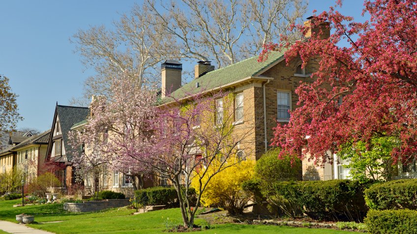 View of one of typical Midwest USA city (Chicago in this case) suburbs neighborhood on a nice spring day.