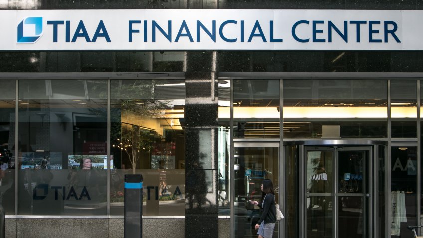 New York, July 19, 2016: TIAA financial center sign at their glass entrance.