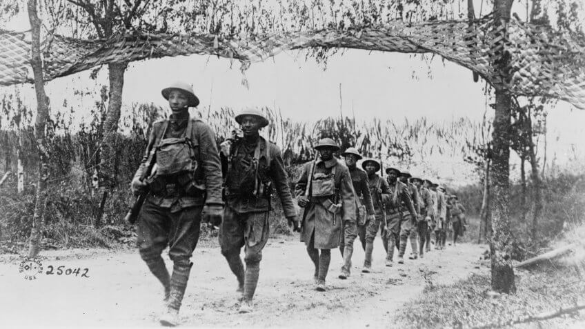 U.S. Army Infantry troops, African American unit, marching northwest of Verdun, France, in World War I