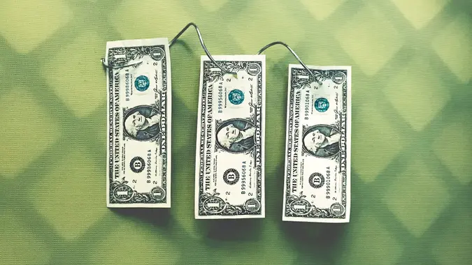 money wire transfer, dollar bills