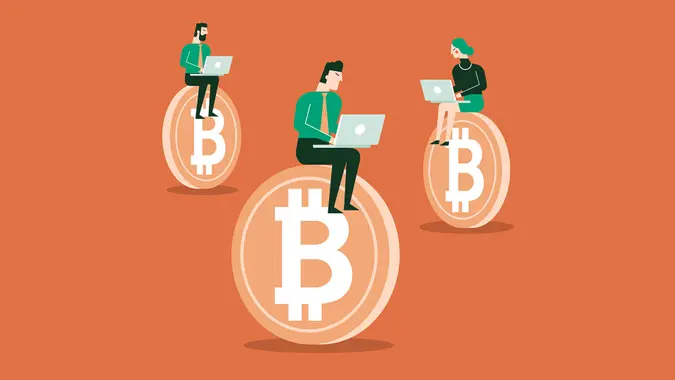 Business people sitting on Bitcoin.
