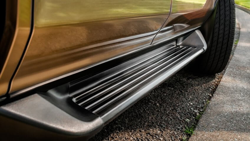 Running Board of Sport Utility Vehicle, close-up.